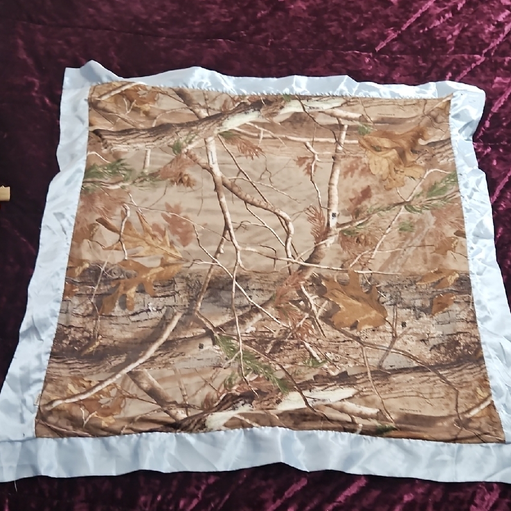 Camouflage Patterned Baby Blanket with Light Blue Trim. Realtree Brand